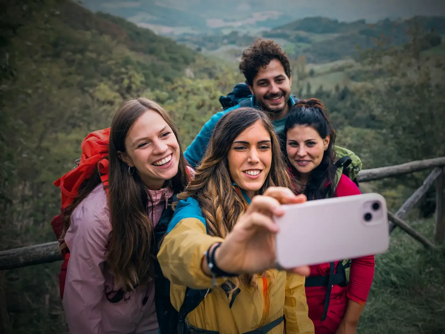 Hiking friends taking a selfie while in the mountians.
